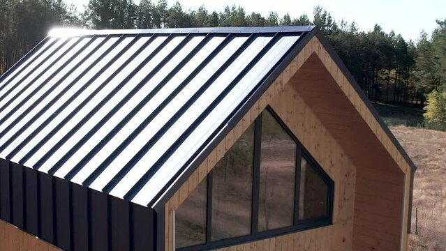 Exterior Of Modular Cabin House With Loft In Rural Landscape. aerial