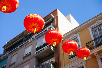 red lanterns chinese Lunar new year in the streets of Spain. Chinatown district