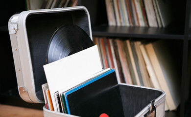 Vinyl record collection for turntable. DJ travel case with set of classic records