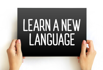 Learn A New Language text on card, concept background
