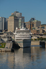 German luxury cruiseship cruise ship liner Amera in port of Montreal, Quebec in Canada with city...