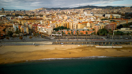 Aerial view of Barceloneta district and Beach front in Barcelona. View with the W hotel in the back