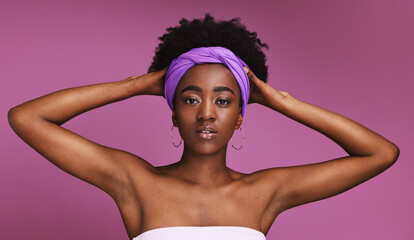 Portrait, beauty and hair with a model black woman on a pink background in studio for natural care....
