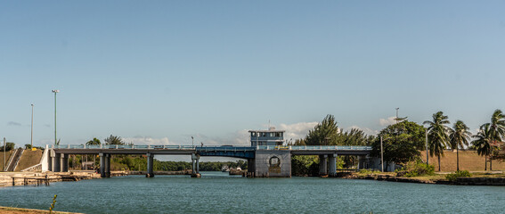 Varadero, Cuba - Feb. 23, Lifting bridge spanning the "Laguna de Paso Malo" connects the peninsula Varadero with city of Santa Marta in the Matanzas district. A sightseeing bus is crossing the bridge