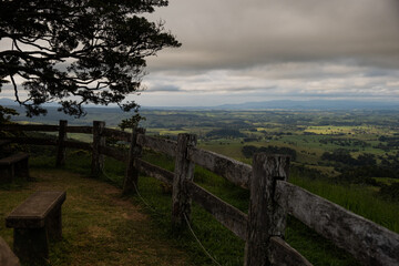 Lush Hilly view over a Valley With clouds rolling over
