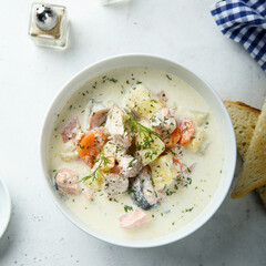Traditional fish soup with vegetables and cream