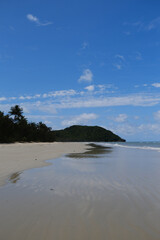 Beautiful Beach view with clouds, rocks and in the jungle 