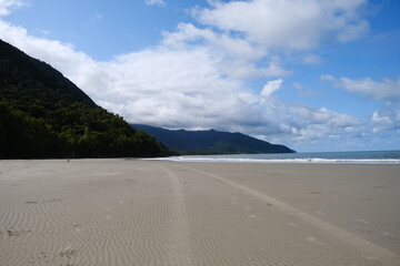 Beautiful Beach view with clouds, rocks and in the jungle 