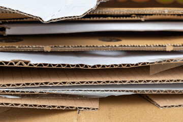 paper waste stacked on top of each other