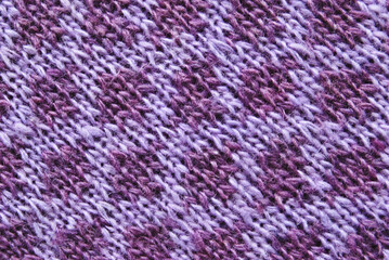 Soft purple ornamental knitted fabric texture as background