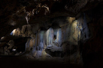 Stone waterfall in the stalactite cave of Iserlohn