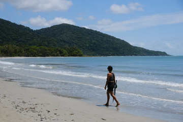 Beautiful Beach view with clouds, rocks and in the jungle 