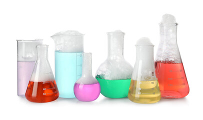 Laboratory glassware with colorful liquids isolated on white. Chemical reaction