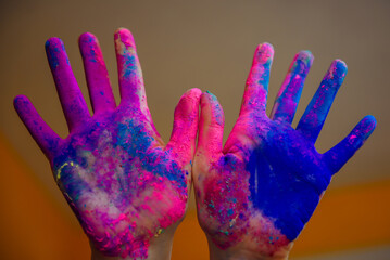 Colorful holi painted hands in different positions. National Indian Holiday Happy Holi