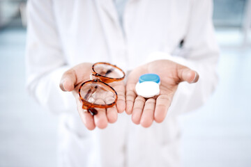 Eye care, choice with glasses or contact lens in hands, closeup and vision with healthcare for...