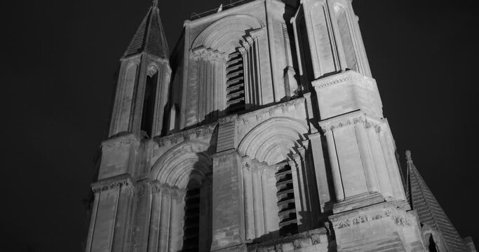 Exterior Of The Abbey Of Saint-Aubin In Angers, France - black and white, tilt down