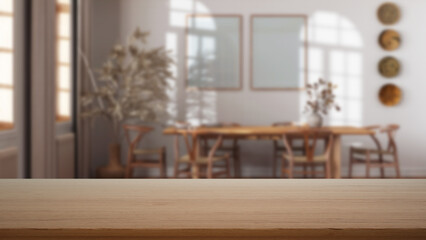 Empty wooden table, desk or shelf with blurred view of japandi farmhouse dining room with table and chairs, modern interior design concept