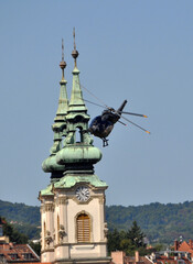 flying helicopter over the church