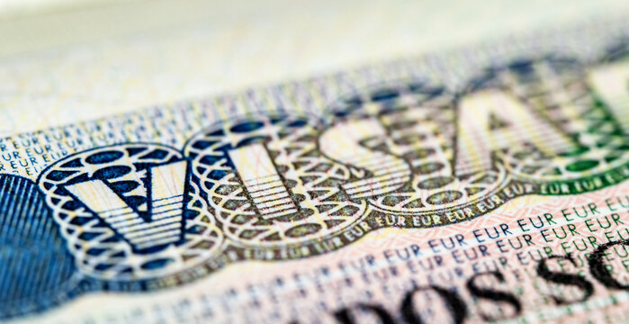 Internationa visa in passport close up view. Schengen visa in passport.