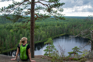Fototapeta na wymiar Woman hiking in Lapland Finland