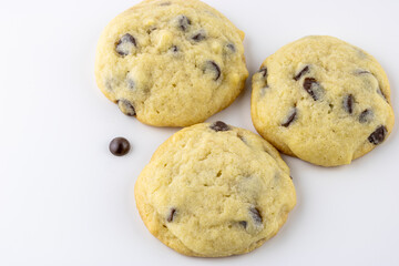 Chocolate chip cookies on white background with text space