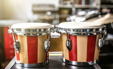 Colorful bongos drums in recording studio for hard beat live perfomance. Professional musical...
