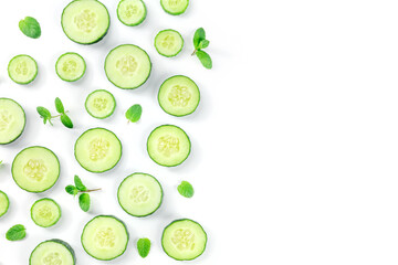 Fresh cucumber and mint on a white background with a place for text, overhead flat lay shot. Healthy organic food banner design