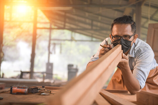 Portrait carpenter man  happy attractive hardworking