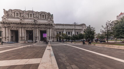 Fototapeta na wymiar Panorama showing Milano Centrale timelapse - the main central railway station of the city of Milan in Italy.