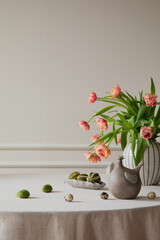 Minimalist composition of easter dining room interior with copy space, vase with tulips, colorful...