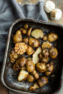 Oven-roasted Jerusalem artichokes with garlic