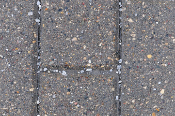 White salt lying on the paving stones
