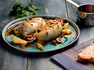 Stuffed calamari with artichokes and olives