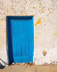 Blue door of an abandoned building. High quality photo