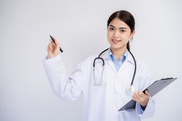 Medical concept of Asian female doctor in white coat with stethoscope and note board on white background