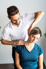 Fototapeta premium A Modern rehabilitation physiotherapy man at work with woman client