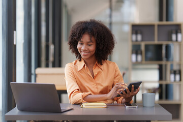 Accountant black woman working on laptop and do document, tax, exchange, accounting and Financial advisor concept