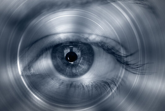 Fototapeta Hypnosis Spiral in eye with vertigo   -  Image of abstract spiral hazel eye 