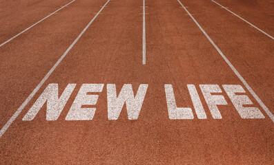 New Life written on running track, New Concept on running track text in white color