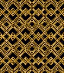Seamless pattern in the Indonesian batik style combines a black and brown background
