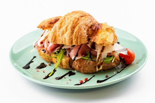 French croissant with jambon and vegetables