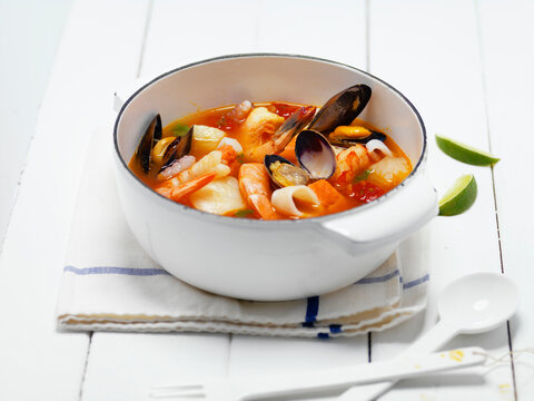 Seafood Stew In White Enameled Casserole Dish