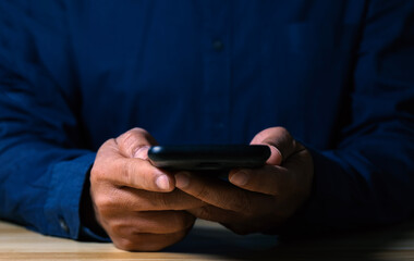 businessman using smartphone on desk online shopping concept new mobile application Smartphone financial transaction close up