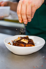 chef cooking dessert in the kitchen