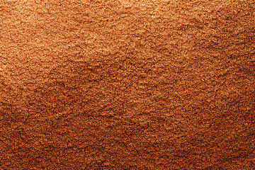 Detail texture of brown cane sugar grains, which are artfully arranged in a textured background. The fine, delicate grains are a rich, warm brown hue that creates a sense of comfort and familiarity. a - obrazy, fototapety, plakaty