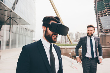 Elegant executive professional businessman bearded using 3D viewer outdoor exploring metaverse cyberspace