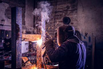 man welding