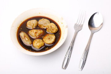 empek empek with cuka or vinegar sauce. empek empek is a traditional food from Palembang Indonesia. pempek palembang. Indonesian dish