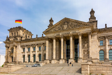 Obraz premium Reichstag building (Bundestag - parliament of Germany) in Berlin with inscription 