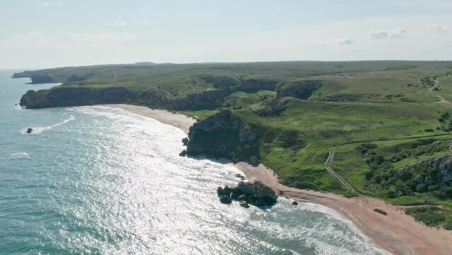 Coastline of wild bech on the sea. Nature and landscape scene.